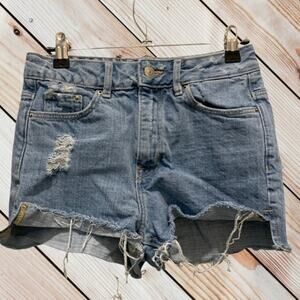 Divided light Wash  cutoff denim frayed hem jean shorts Size 4. Distressed jeans